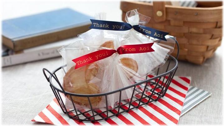 Actual product image Brother TZe-RW34 (1.20 cm, Gold, Red)
