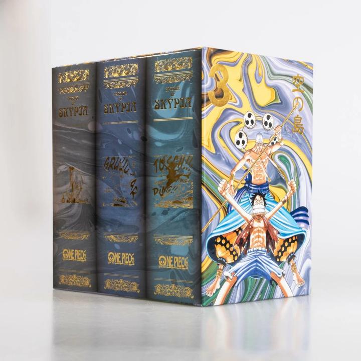 Immagine prodotto One Piece Sammelschuber 3: Skypia (inklusive Band 24–32) (Tedesco, Eiichiro Oda, 2023)