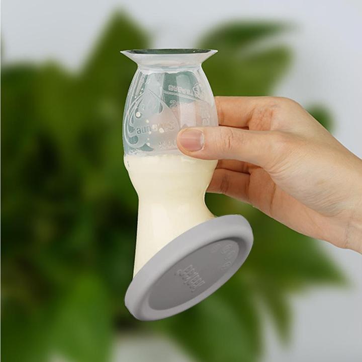 Produktbild Haakaa Muttermilchpumpe mit Saugfuss 100ml + Silikondeckel Set