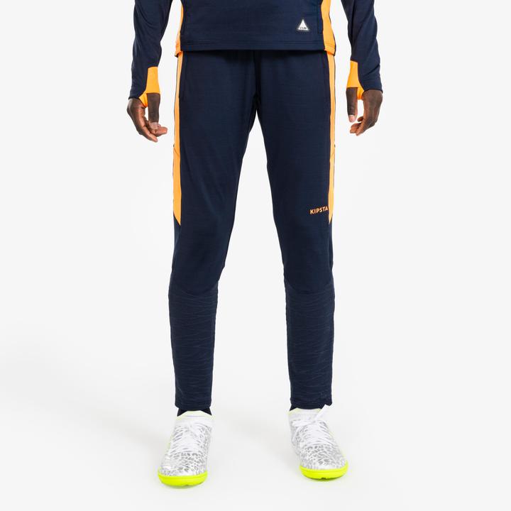 Produktbild Kipsta Kinder Fussball Trainingshose - CLR orange/marineblau (10, 11, 12)