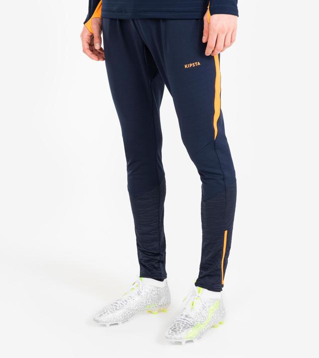 Actual product image Kipsta Women's/men's football training trousers - CLR orange/navy blue (W27)