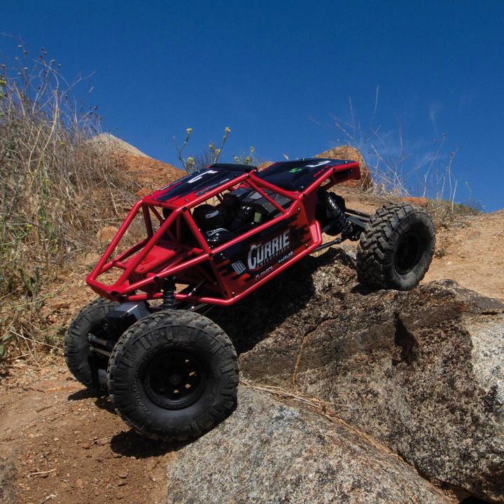 Actual product image Axial Capra 1.9 Unlimited Trail Buggy Electric Brushed Crawler 4WD 1:8 RTR Red (RTR Ready-to-Run)