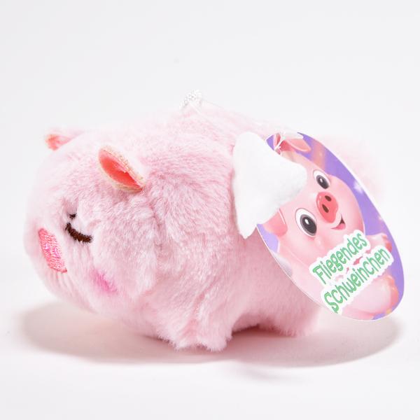 Actual product image Kögler Flying piggy, with vibration and rotating tail in 3 assorted designs (6 cm)