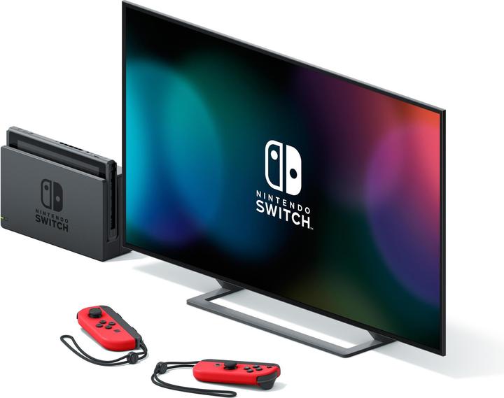 Actual product image Nintendo Switch Red + Super Mario Odyssey Download Code + The Super Mario Bros. Movie Sticker