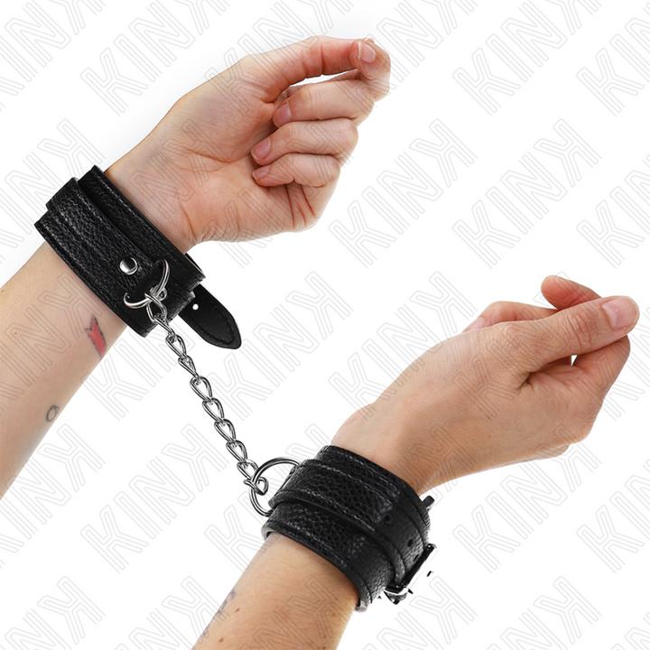 Actual product image Pipedream KINK - WRIST CUFFS WITH SNAKE PATTERN, BLACK, ADJUSTABLE 20-28 CM X 5,4 CM