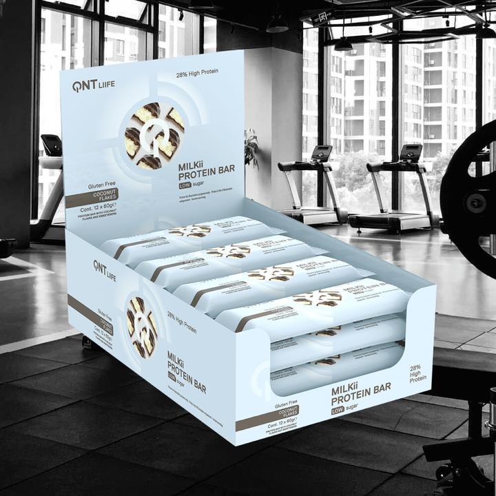 Produktbild QNT Milkii Protein Bar 12x60g (Kokosnuss, 12 Stk., 720 g)