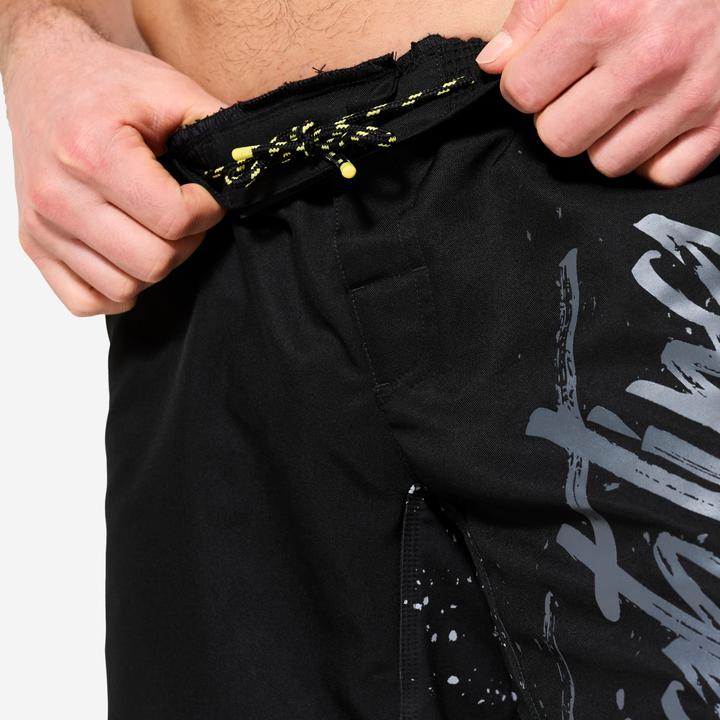 Actual product image Domyos MMA-ShortsHerren strapazierfähig - schwarz/gelb (L)