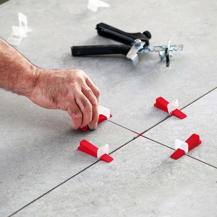 Actual product image XPOtool Tile Levelling System Set Pro 100 Tile Wedges and 100 Pull Tabs 2.0mm Laying Aid