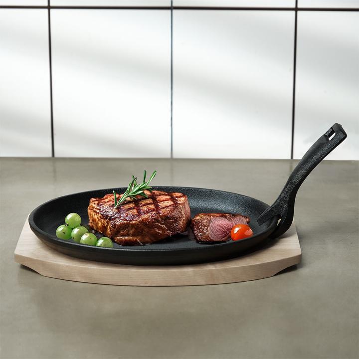 Produktbild Casativo Profi Servierpfanne aus Gusseisen mit Holz-Untersetzer, 24 x 14 x 2,2 cm (Bratpfanne, Gusseisen)