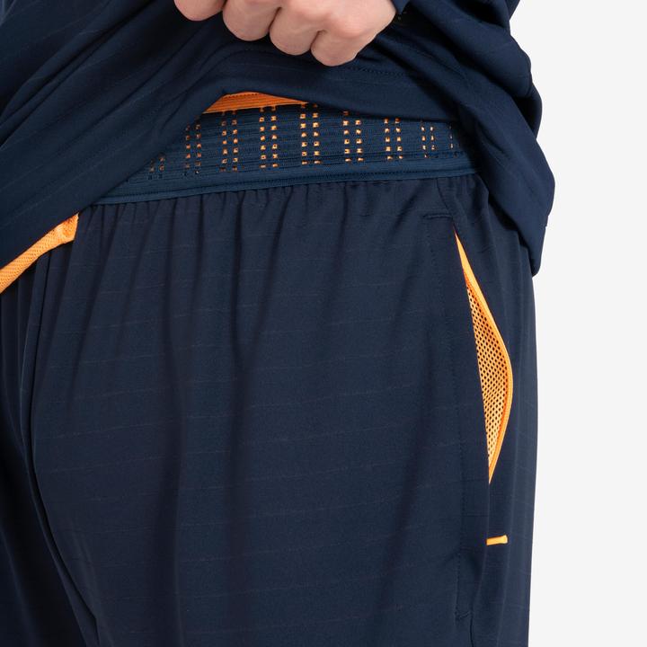 Actual product image Kipsta Women's/men's football training trousers - CLR orange/navy blue (W27)