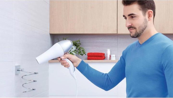 Actual product image tesa EKKRO hairdryer holder incl. adhesive solution without drilling