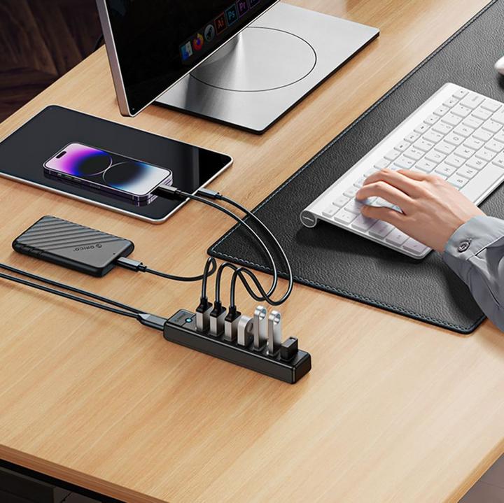 Produktbild Orico Converter PW7U-U3 hub 7x USB-A 3.0 + USB-C 5V/3A 1m - black (USB-C, 7 Ports)
