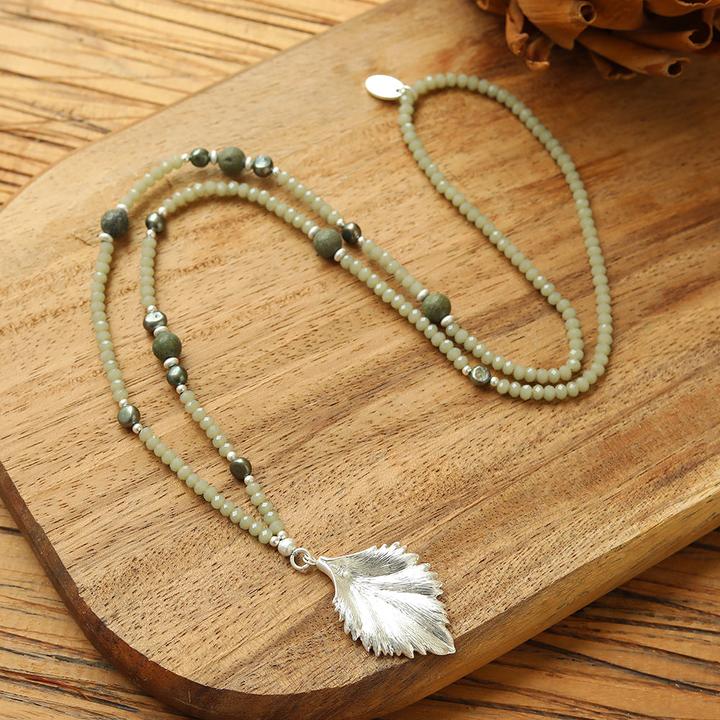 Immagine prodotto Andreani Collana con ciondolo a forma di foglia in vere perle d'acqua dolce verdi e vetro (Vetro)