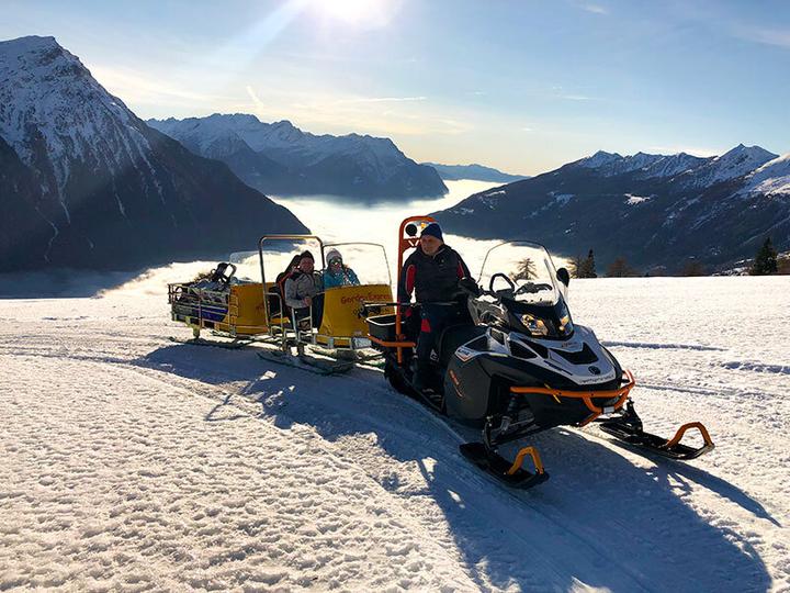 Produktbild Smartbox Gourmet-Ausflug in die Höhe mit Fondue und Fahrt mit dem Schneemobil für 6 in Aquila (6 Pers.)