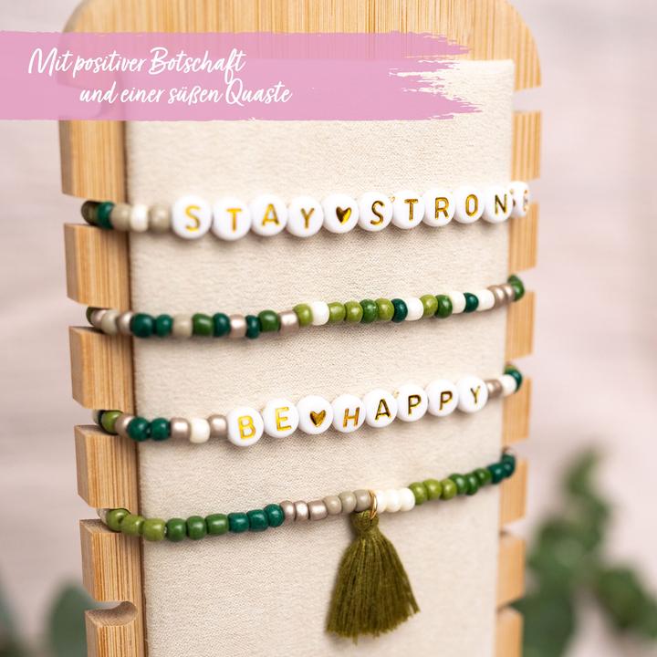 Papierdrachen 4 Perlenarmbänder – BE HAPPY und STAY STRONG (Kunststoff, Gummi, Stoff)
