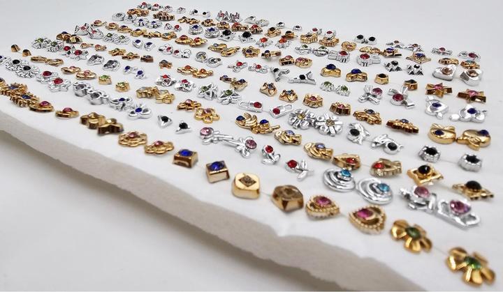 Actual product image ZigZag 100 pairs of assorted stud earrings with 100 rubber stoppers (Plastic)