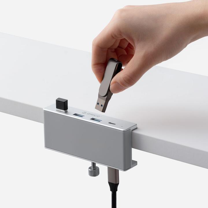 Actual product image Orico Converter MH4PC Hub Clamp-Mounted USB-C / 3x USB-A 3.0 + 1x USB-C 3.0 - Silver (USB-C)
