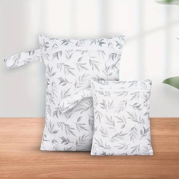 Produktbild ASMI 2 Stück Wetbag Windeltasche Set 36x25cm + 25x19cm Grüne Blätter