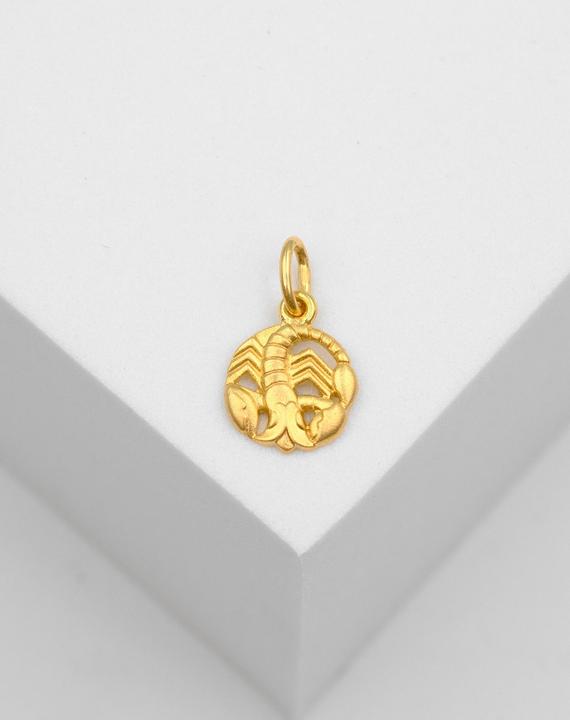 Actual product image Muau Scorpio (750/18K yellow gold)