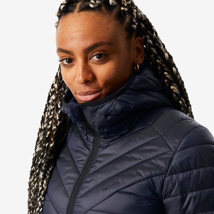 Immagine prodotto Wedze Giacca da sci da donna in piumino leggero e caldo - 500 blu/nero (S)
