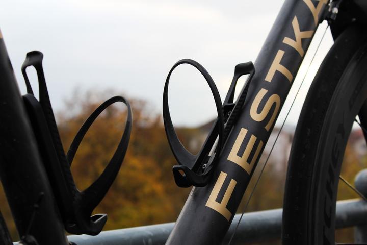 Actual product image NG Sports Thymeen bottle cage, Nylon + Carbon, ultralight, black matte