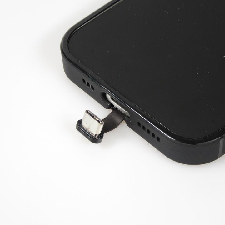 Actual product image PhoneLook Cover Silicone Glossy integrated LED light with USB-C connection Floating Astronaut (Apple iPhone 15 Pro Max)
