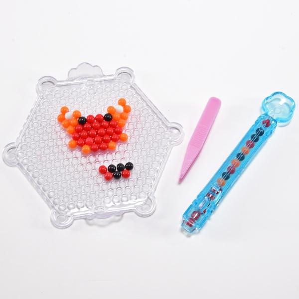 Produktbild Kögler Magic Beads, magische Wasserperlen, Dinosaurier, 1