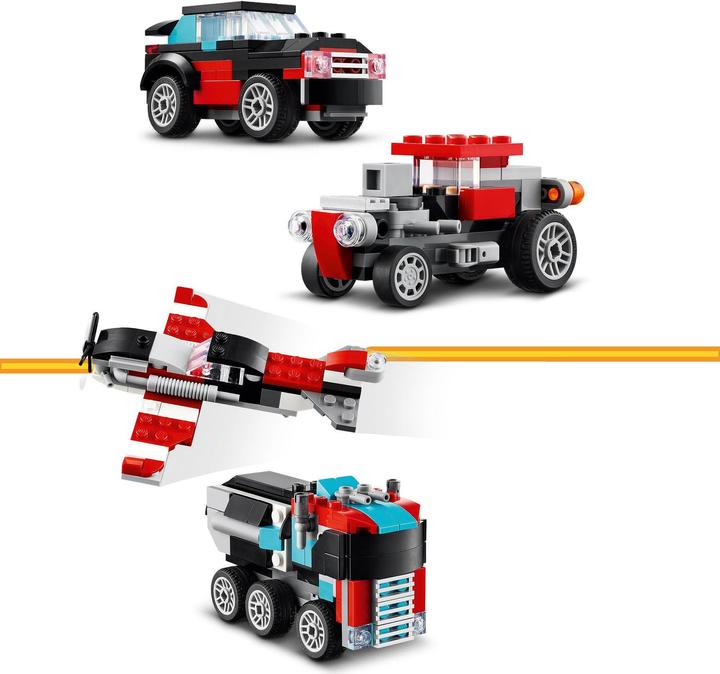 Actual product image LEGO 31146 Low loader with helicopter (31146, LEGO Creator 3-in-1)