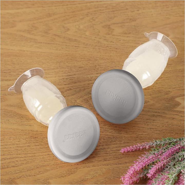Produktbild Haakaa Muttermilchpumpe mit Saugfuss 100ml + Silikondeckel Set
