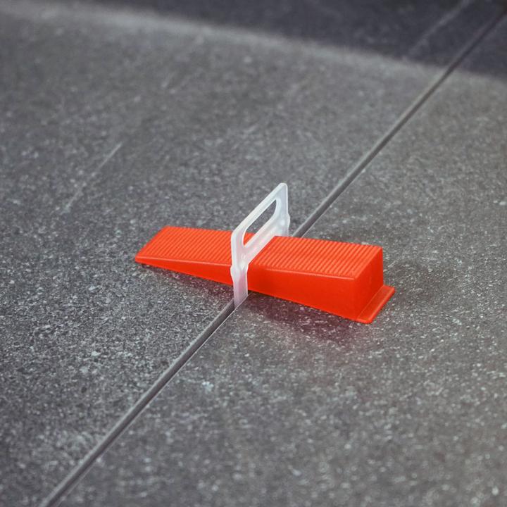 Actual product image XPOtool Tile Levelling System Set Pro 100 Tile Wedges and 100 Pull Tabs 2.0mm Laying Aid