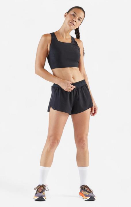 Immagine prodotto Kiprun Laufshirt Crop Top Damen leicht - Race Crop Light 900 schwarz Méline Rollin (S)