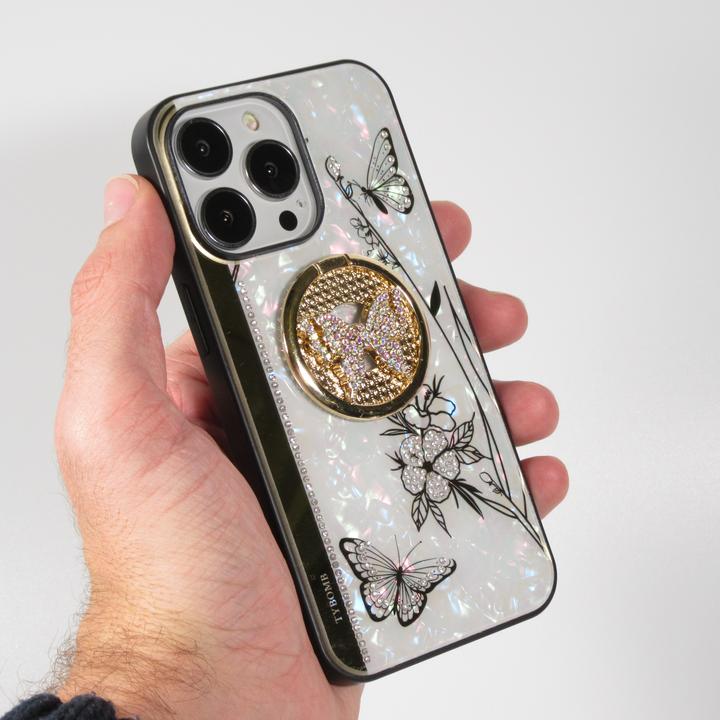Actual product image PhoneLook Coque Nacre papillon strass avec support vidéo (Apple iPhone 13 Pro Max)