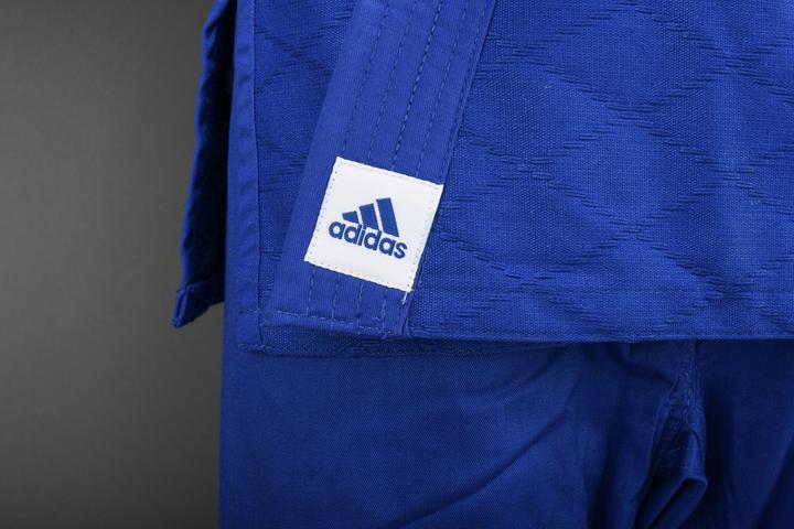 Immagine prodotto adidas Judogi Club Blau (Mit Schulterstreifen, Trainingsanzug (120 C)