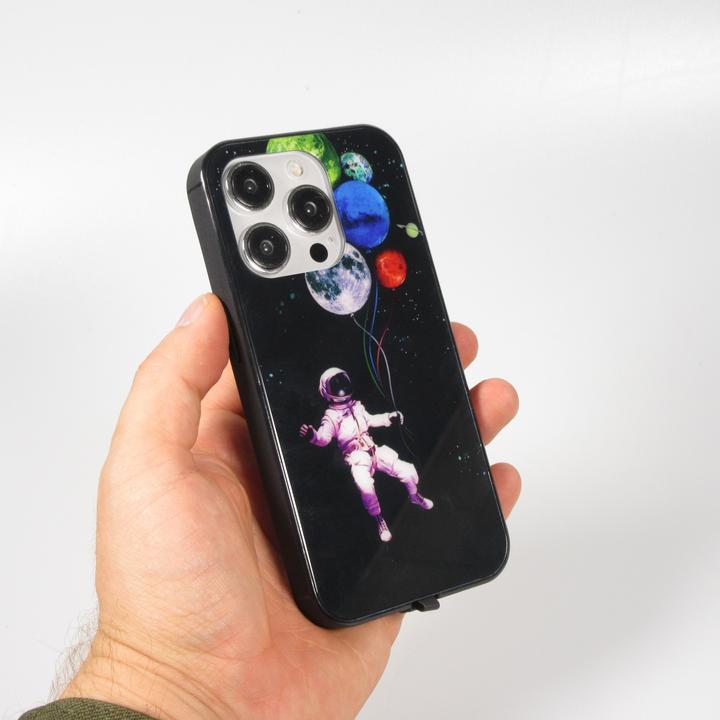 Actual product image PhoneLook Cover Silicone Glossy integrated LED light with USB-C connection Floating Astronaut (Apple iPhone 15 Pro Max)