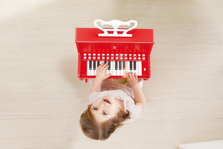 Actual product image Hape Light keyboard piano with stool, red FSC