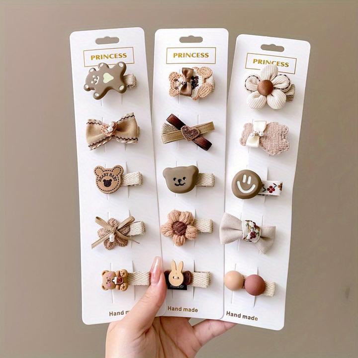 Activity Board 15/20pcs niedliche Cartoon Tier lächelndes Gesicht Bogen Blume Haarspangen, geeignet für Party (1 Stk.)