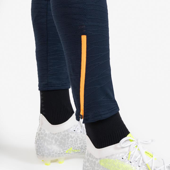Actual product image Kipsta Women's/men's football training trousers - CLR orange/navy blue (W27)