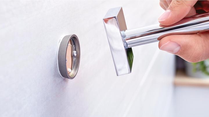 Actual product image tesa EKKRO hairdryer holder incl. adhesive solution without drilling