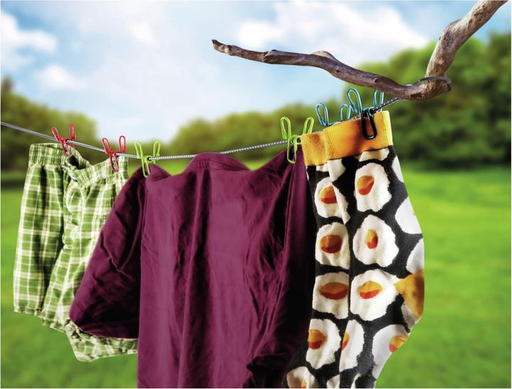 Actual product image Calima CAMPING EQUIPMENT Travel clothesline with 10 pegs