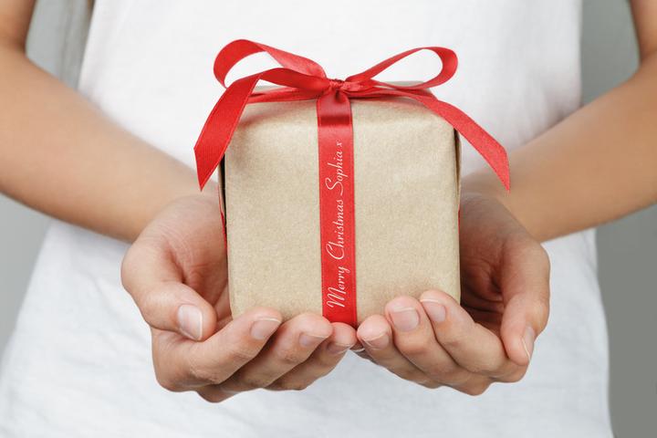 Actual product image Brother TZe-RW34 (1.20 cm, Gold, Red)