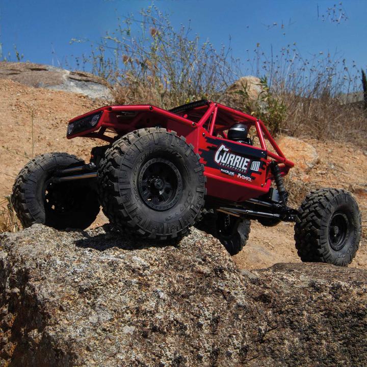 Actual product image Axial Capra 1.9 Unlimited Trail Buggy Electric Brushed Crawler 4WD 1:8 RTR Red (RTR Ready-to-Run)