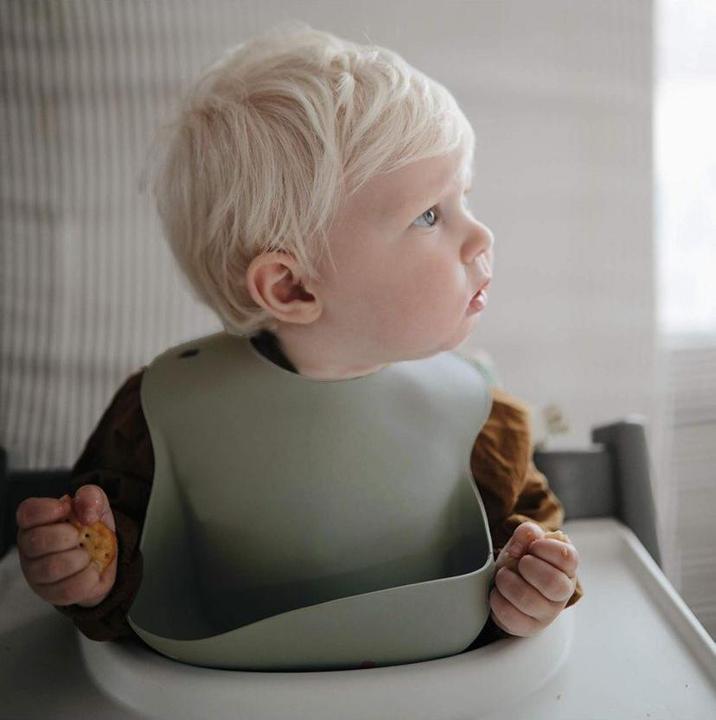 Produktbild Mushie Silikon Lätzchen Dove Grey