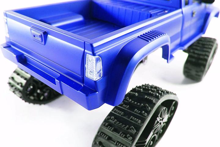 Actual product image Amewi RC AMX Pickup Truck RTR blue with wheels & chains 4WD (RTR Ready-to-Run)
