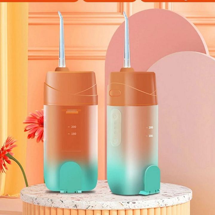 Image du produit OEM Consumer electronics Electric oral irrigator 200 ml 4 tips RC-K-563 orange