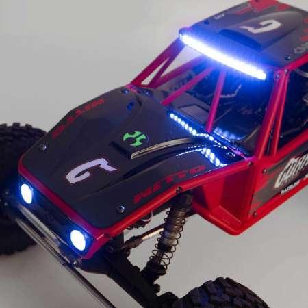 Actual product image Axial Capra 1.9 Unlimited Trail Buggy Electric Brushed Crawler 4WD 1:8 RTR Red (RTR Ready-to-Run)