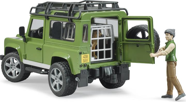 Produktbild Bruder Land Rover Defender Station Wagon mit Förster und Hund