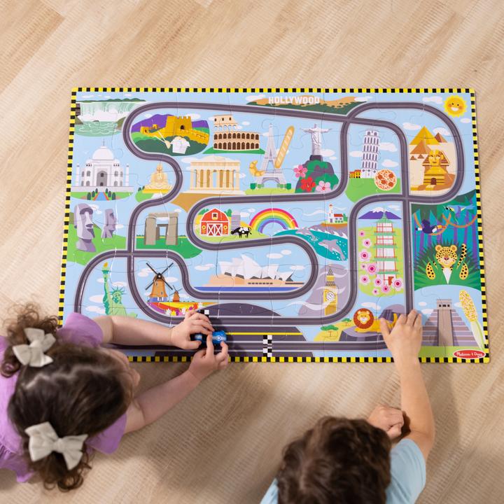 Produktbild Melissa & Doug Race Around the World Tracks Floor Puzzle (31009) (48 Teile)