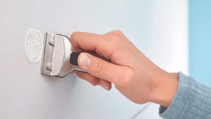 Actual product image tesa MOON hairdryer holder incl. adhesive solution without drilling