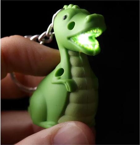 Actual product image Roost Keychain Dino KEY59 LED 10x2.5x4cm