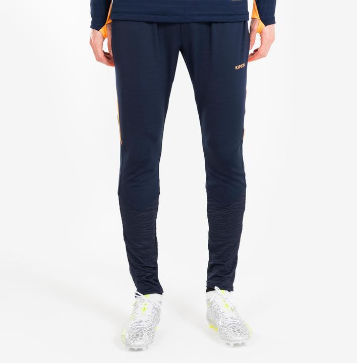Actual product image Kipsta Women's/men's football training trousers - CLR orange/navy blue (W27)